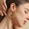 Exaggerated oversized hoop earrings, versatile and creative women's ear cuffs, simple, stylish, and classic gold earrings.